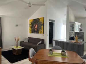 Χώρος καθιστικού στο Superbe condo près de la plage
