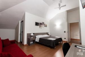 Postel nebo postele na pokoji v ubytování Opera B&B