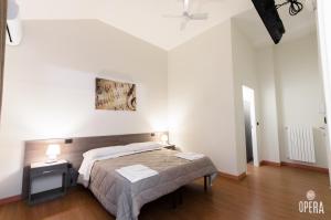 Postel nebo postele na pokoji v ubytování Opera B&B