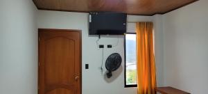 TV a/nebo společenská místnost v ubytování Hotel Rivera