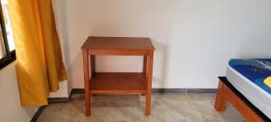 Llit o llits en una habitació de Hotel Rivera