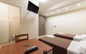 TV a/nebo společenská místnost v ubytování Opera B&B