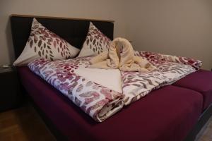Postel nebo postele na pokoji v ubytování Appartement Lilia