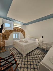 Ένα ή περισσότερα κρεβάτια σε δωμάτιο στο Casa Novelli 22