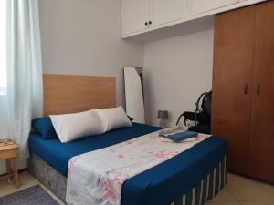 Voodi või voodid majutusasutuse Mendes Family Homestay - B&B In The Heart Of Praia toas