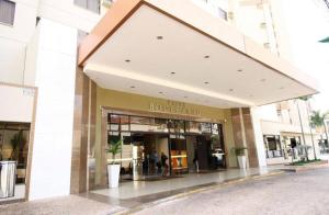 a store front of a building with a storefront at Hotel boulevard caldas novas in Caldas Novas
