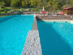 Bazén v ubytování Hotel Le Pozze Di Lecchi nebo v jeho okolí