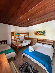 Postel nebo postele na pokoji v ubytování Pousada Brisamar Paraty COMECE O DIA COM UM CAFÉ DA MANHÃ INESQUECÍVEL