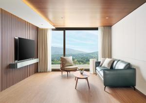 TV a/nebo společenská místnost v ubytování Hanwha Resort Gyeongju