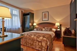 Posteľ alebo postele v izbe v ubytovaní Elysee Hotel