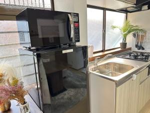 一棟貸切 駒込フルリノベーション古民家 Switch付き 池袋新宿渋谷秋葉原にあるキッチンまたは簡易キッチン