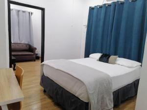 Postel nebo postele na pokoji v ubytování Apart Hotel Express