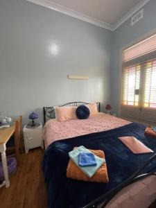 Кровать или кровати в номере HISTORIC STAR LODGE Narrandera