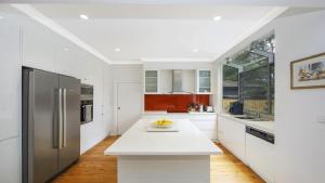 Kuchyň nebo kuchyňský kout v ubytování Diamond House Pearl Beach