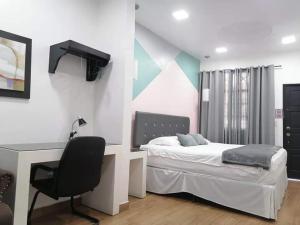 Postel nebo postele na pokoji v ubytování Apart Hotel Express