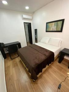 Postel nebo postele na pokoji v ubytování Apart Hotel Express