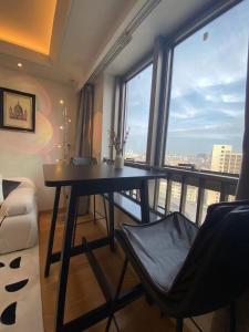 Balkón nebo terasa v ubytování Shanghai Lerongju Boutique Apartment Metro Line 8 20meter