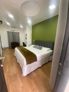 Postel nebo postele na pokoji v ubytování Apart Hotel Express