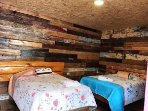 Postel nebo postele na pokoji v ubytování Hotel Areca