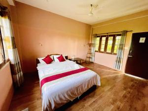 Ένα ή περισσότερα κρεβάτια σε δωμάτιο στο Tree Tops Retreat B&B