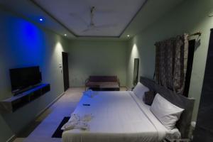 Postel nebo postele na pokoji v ubytování Hotel Peppers
