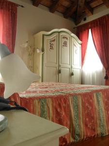 Postel nebo postele na pokoji v ubytování Residence Meuble' Cortina