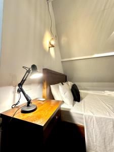 Letto o letti in una camera di Rustic Cottages Udawalawe