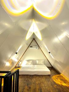 Letto o letti in una camera di Rustic Cottages Udawalawe