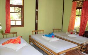 Voodi või voodid majutusasutuse Azure Camotes Resort Hotel toas