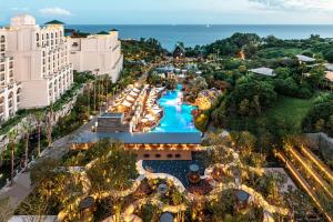 an aerial view of the pool at the resort at Lotte Hotel Jeju in Seogwipo