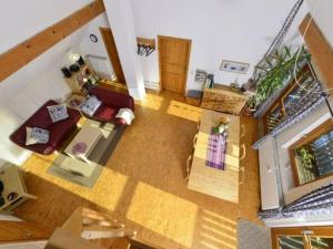 an overhead view of a living room with a couch at Holiday home Keim Comfortable Vacation Home in Negenborn