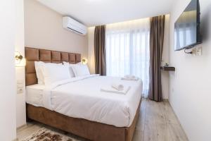 Ένα ή περισσότερα κρεβάτια σε δωμάτιο στο LDV 13 Apartments Free private parking