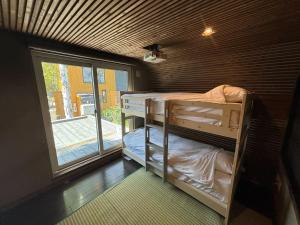 Giường trong phòng chung tại A1 Niseko