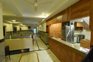 Kuchyň nebo kuchyňský kout v ubytování Hotel Swadesh Heritage