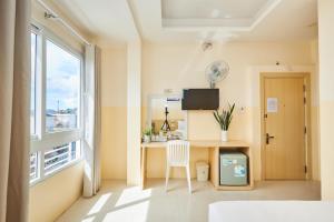 Μια τηλεόραση ή/και κέντρο ψυχαγωγίας στο Ngoc Nguyen Anh Hotel Da Lat