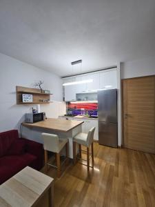 Kuchyňa alebo kuchynka v ubytovaní ABA1 apartman