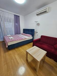 Posteľ alebo postele v izbe v ubytovaní ABA1 apartman