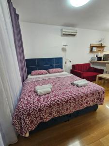 Posteľ alebo postele v izbe v ubytovaní ABA1 apartman