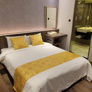 Voodi või voodid majutusasutuse 雅莊旅館 toas