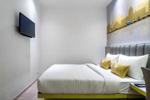 TV a/nebo společenská místnost v ubytování Hotel Le Roi Express Karol Bagh