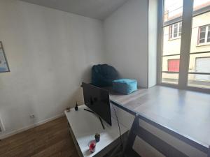 Posezení v ubytování Appartement dans une ancienne usine