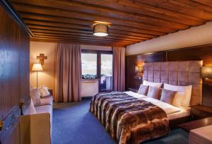 Postel nebo postele na pokoji v ubytování Boutiquehotel Säumler