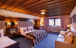 Postel nebo postele na pokoji v ubytování Boutiquehotel Säumler