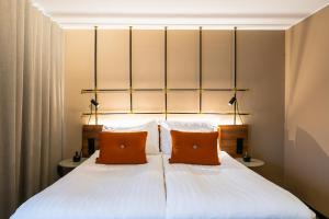 Katil atau katil-katil dalam bilik di Clarion Hotel Winn