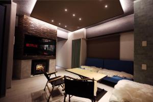 ภาพในคลังภาพของ MolinHotels206-札幌市定山渓天然温泉に紅葉シーズン到来-K-bed1 & S-bed3 ในJozankei +68 ภาพ
