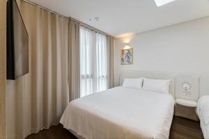 Postel nebo postele na pokoji v ubytování #Elbon The Stay