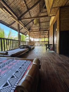 Gallery image of Tranquil Getaway Lilly Room, Dahlia Room, Aster Room and Poppy Room & Dive Center in Mabini +12 photos