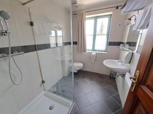 Koupelna v ubytování Parma Guesthouse & Apartments + 29 fotografií
