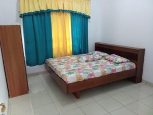 Ένα ή περισσότερα κρεβάτια σε δωμάτιο στο Villa PURI RIFADE