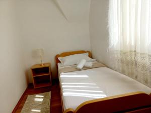 Postel nebo postele na pokoji v ubytování TARA Vila Rajak